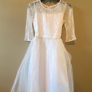 White dress firsr communion